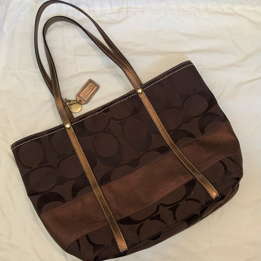 Dark brown Coach small tote with bronze accents
